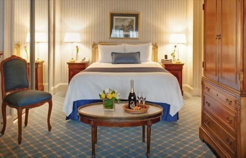 Queen Bedded Deluxe Room at Hotel Elysee New York by Library Hotel Collection.  Approximately 300 square feet.  Suitable for up to 2 adults.