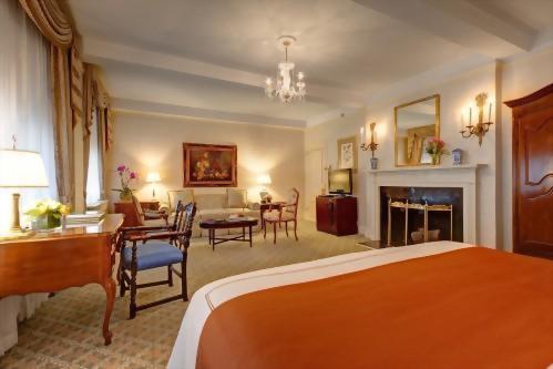 Junior Suites at the Hotel Elysee in New York City have faux fireplaces to add to the romance of your getaway.  With 450 square feet of space there is plenty of room to kick back and relax.