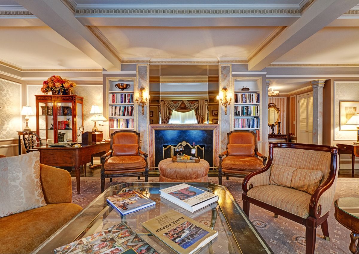 Seating Area and Fireplace in a Presidential Suite