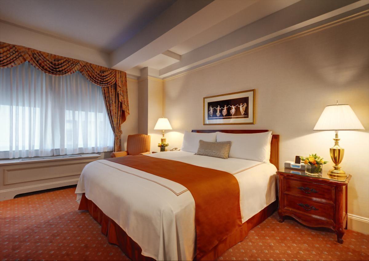 King Suite at the Hotel Elysee with 1 King bed and 1 queen size sofa bed.  Approximately 600 square feet and suitable for up to 3 adults or 2 adults and 1 child.