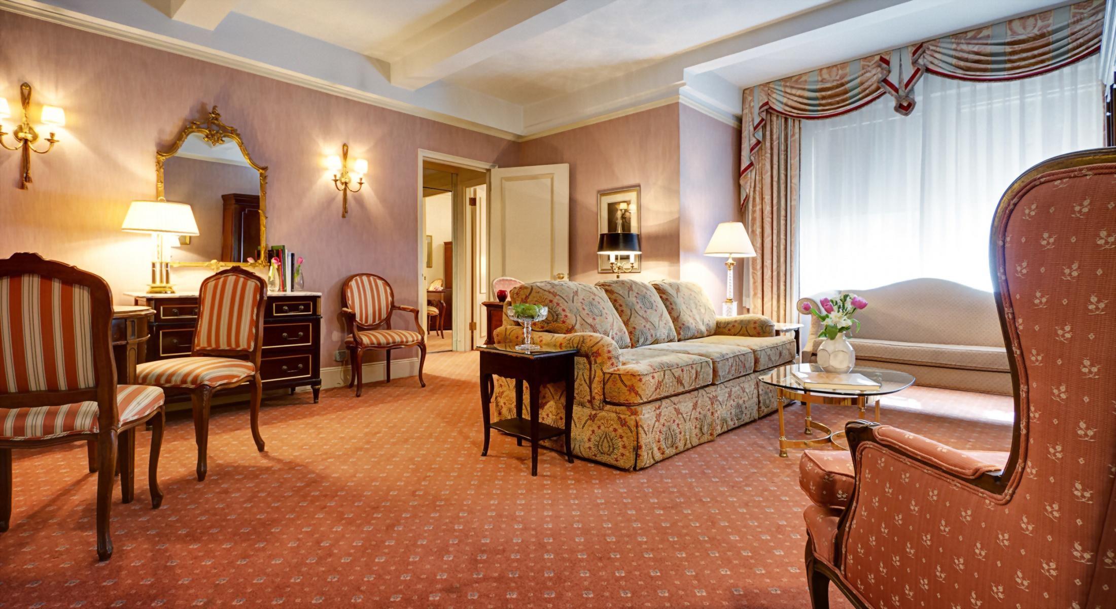 The beautiful living room of a Grand King Suite at the Hotel Elysee.  In total this room is approximately 650 - 700 square feet and is perfect for a family of 4.