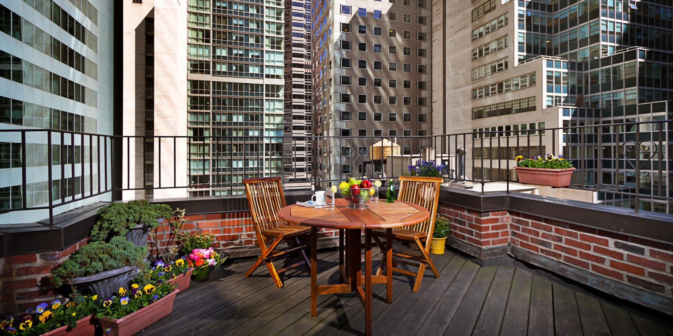 outdoor terrace with views overlooking midtown Manhattan