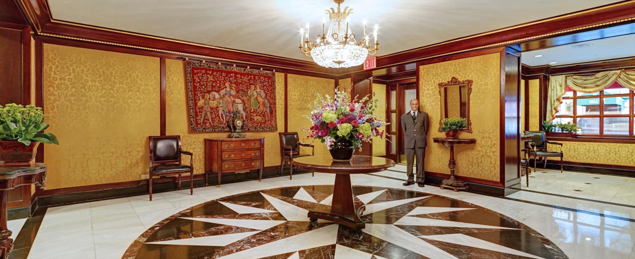 The grand lobby at the Hotel Elysée is always welcoming and decorated with beautiful fresh flowers.