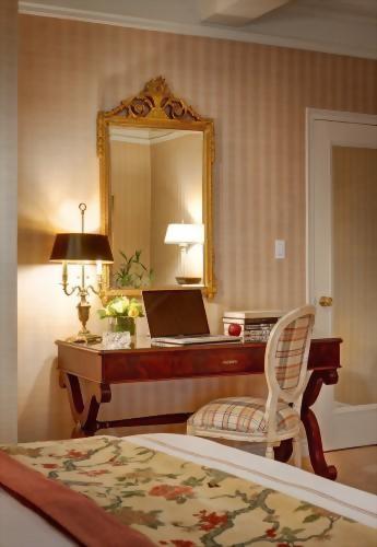 The bedroom of the Parlor Suite is so elegant.
