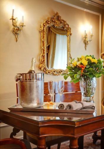Enjoy a bottle of champagne in the dining room area of the Parlor Suite.  This suite offers approximately 900 square feet of living space with a walk in closet!