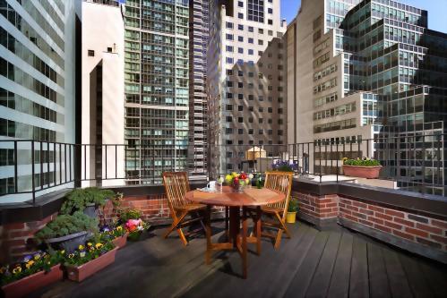 Outdoor balcony right off the bedroom of the Piano Suite offers the most striking city views.